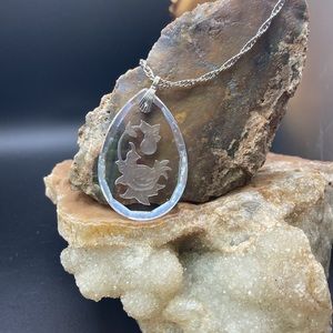 Hallmark jewelry silvertone necklace with crystal pendant.